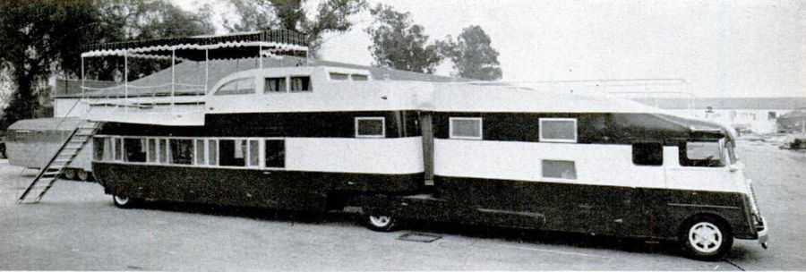 Side view of the 65-foot long trailer in black and white